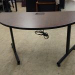 Crescent/Half Circle Computer Desk For Sale w/ Outlet & Plug – 5ft at Longest Length – 29 Inches at Longest Width – 29 Inches from Ground – Used 2 Available